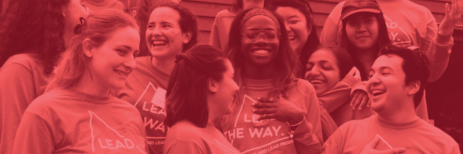 background of students smiling and looking in various directions